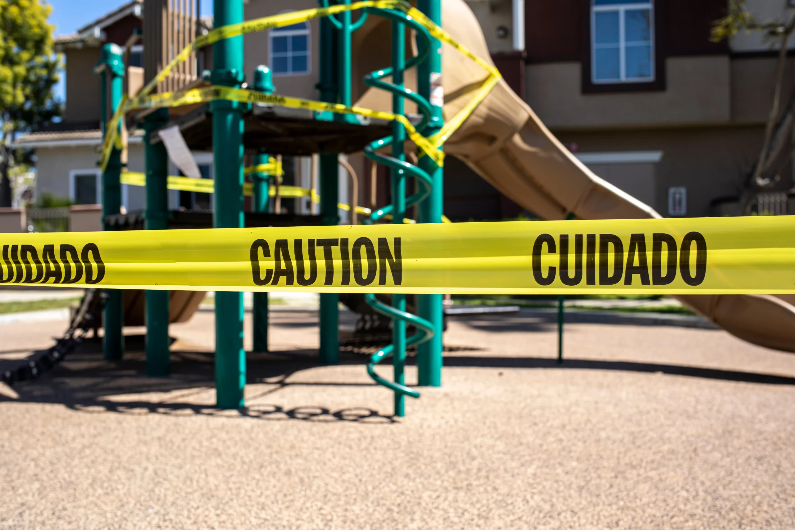 Caution tape surrounds a playground